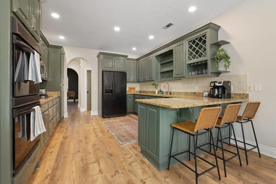 Our kitchen is complete with a barstool seating and all the essentials you need to create your favorite meal, baked good or cup of coffee.