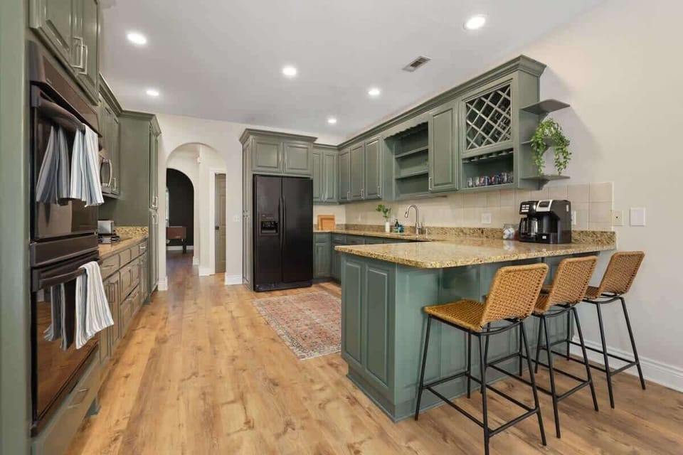 Our kitchen is complete with a barstool seating and all the essentials you need to create your favorite meal, baked good or cup of coffee.