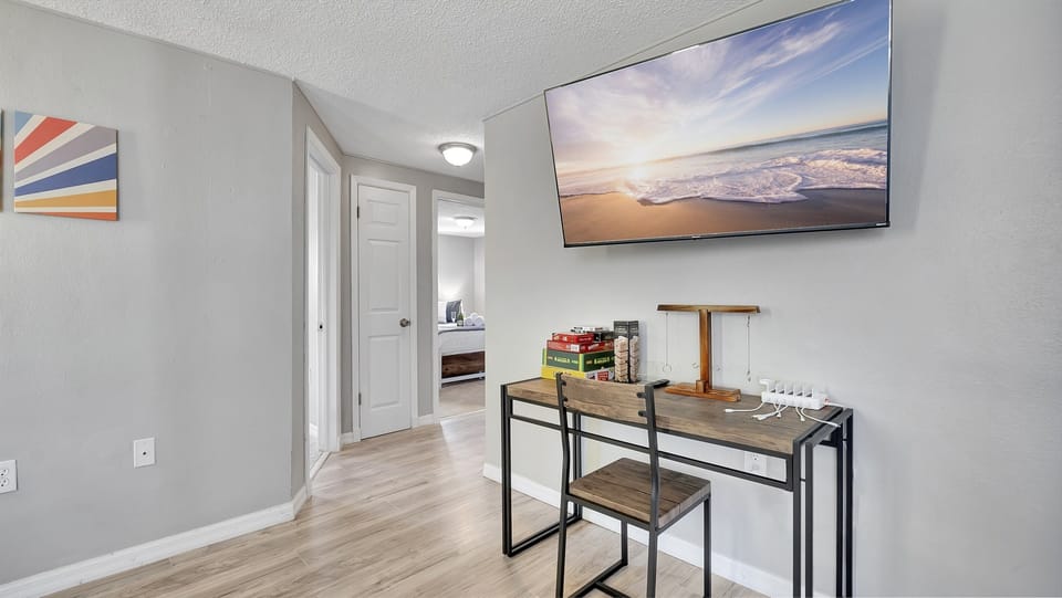 Your entertainment needs are met with a state-of-the-art smart TV, ready to stream your favorite shows and movies.
