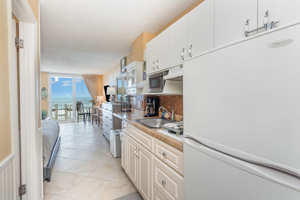 Full Size Fridge. 2 Burner Stove. Microwave. 12 Cup Coffee Pot