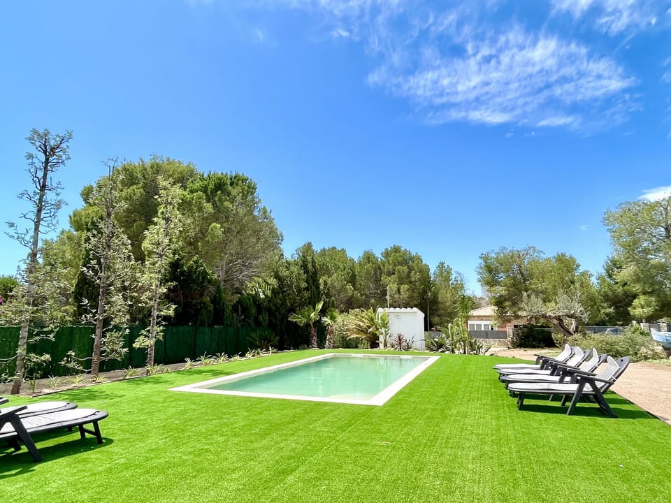 Private swimming pool with sunbeds