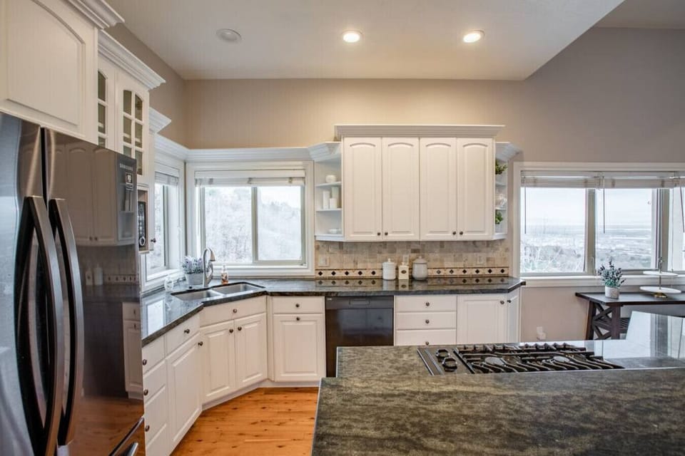 Spacious kitchen with ample counter space and natural light