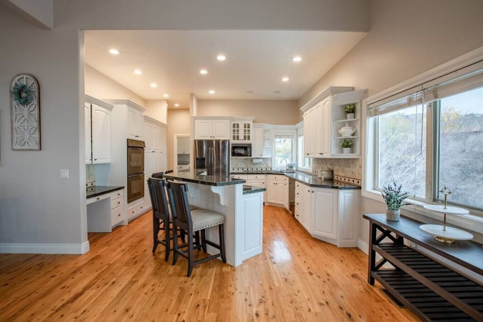 Open space kitchen with large island and modern finishes
