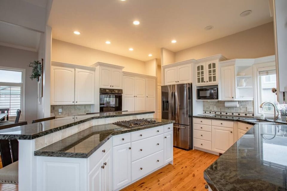 Open kitchen with generous counter space and modern finishes
