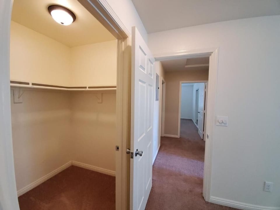 Walk-In Closet Master Bedroom and view to Room # 3