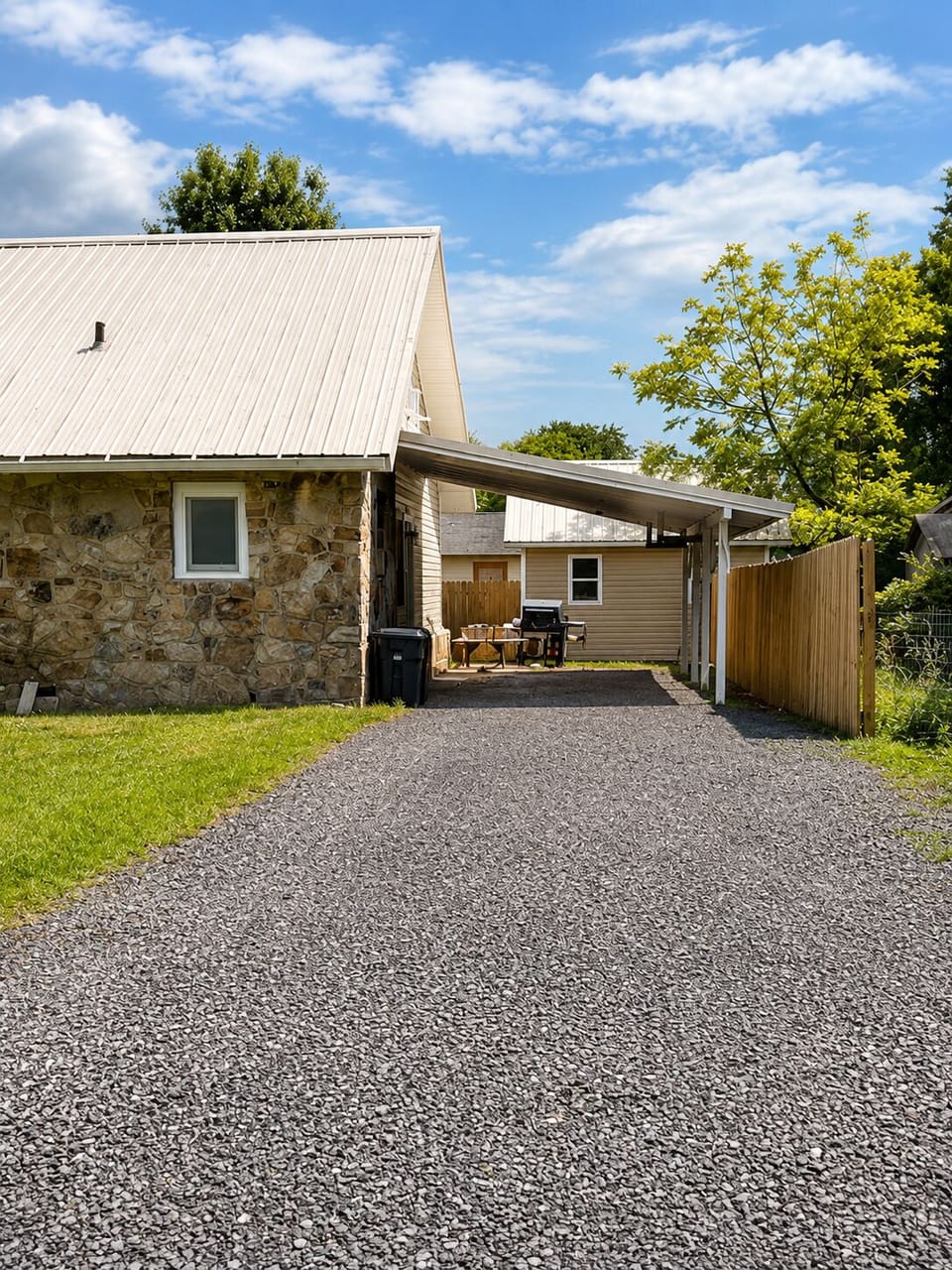 Covered parking and entrance to studio suite