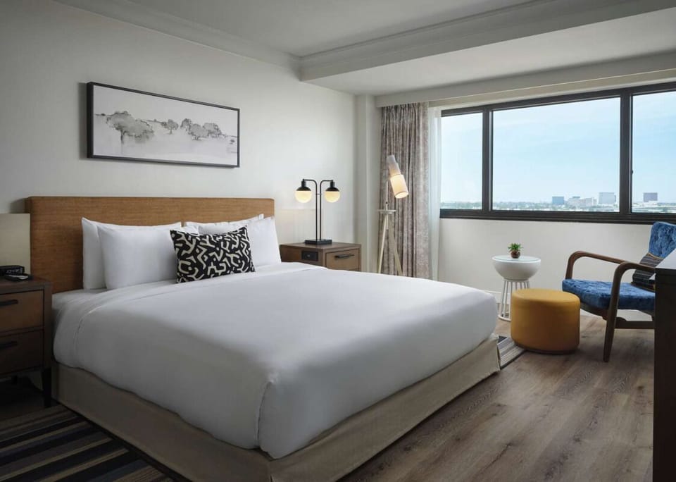 Sink into plush bedding and relax by the sunny window.