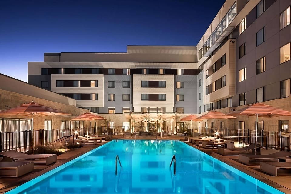 Unwind after dark with a glowing, resort-style pool oasis.