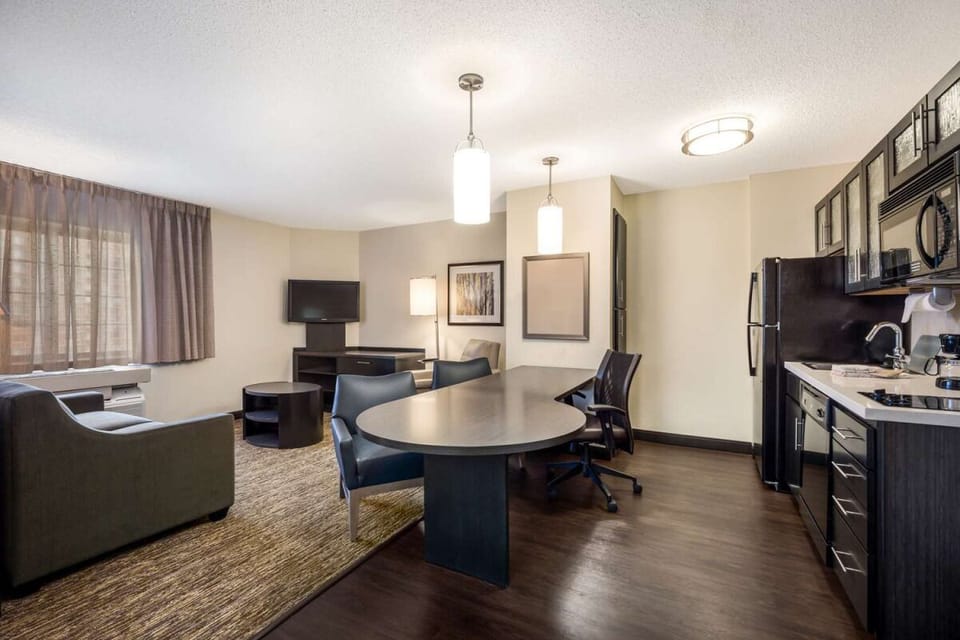 Gather for movies and meals in this bright, open suite.