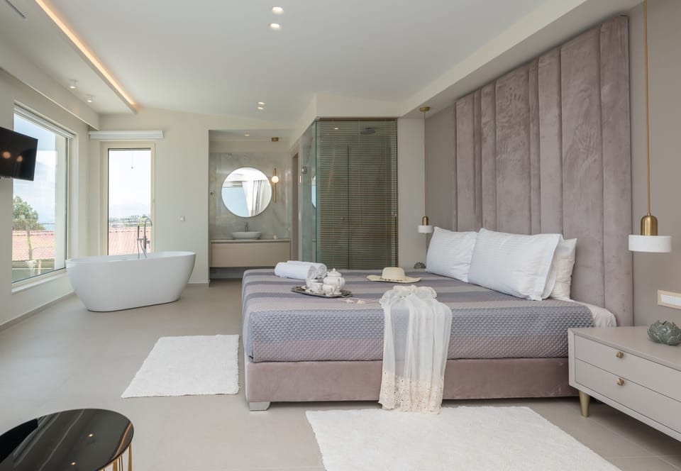 Unwind and recharge in the elegant master bedroom, a true haven of relaxation.