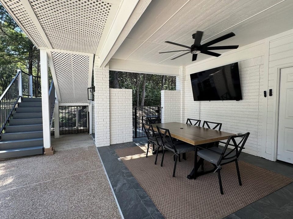 Pool Cabana with stairs that lead up to Event Space