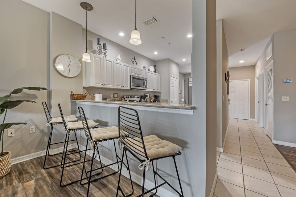 Enjoy meals or a quick snack at the kitchen eating bar.