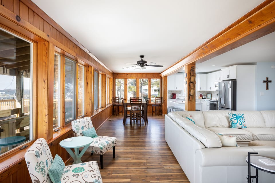 Open kitchen, dining area, & living area with great views 
