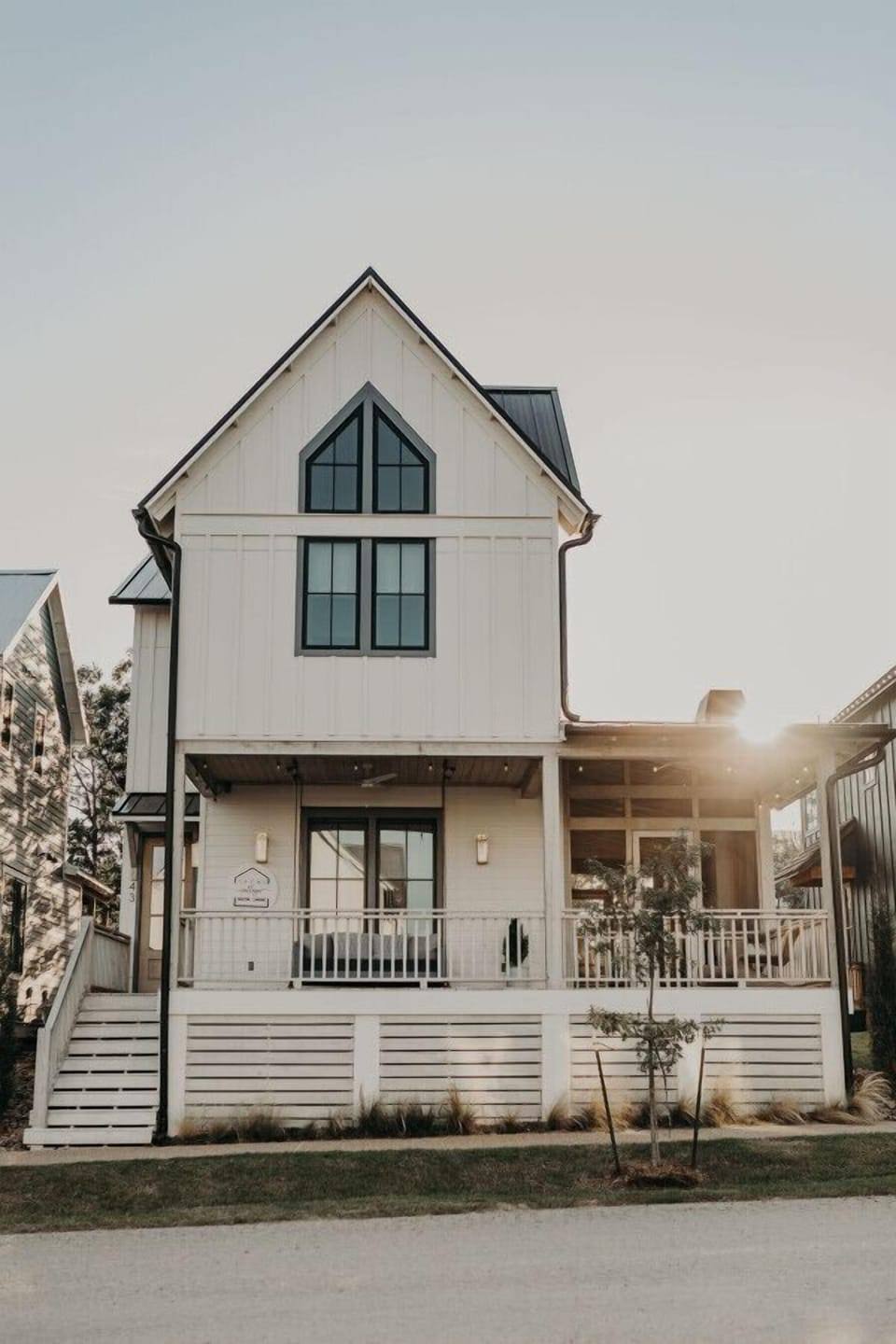 Charming lakehouse with a wrap-around porch—perfect for visiting with neighbors or quietly sipping coffee or wine