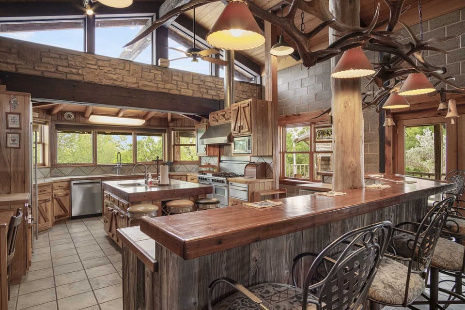 Bar stool seating marks the gateway to the Lodge's full country kitchen!