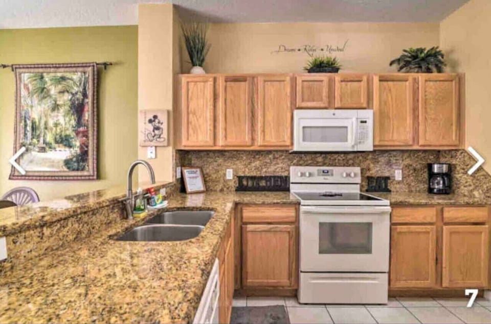 Modern open kitchen designed for cooking and conversation.