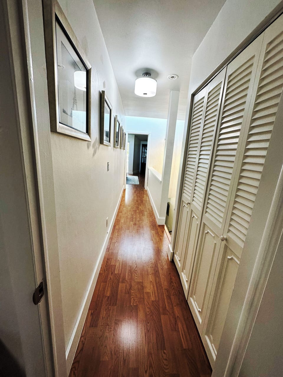Hallway second floor with additional closet.