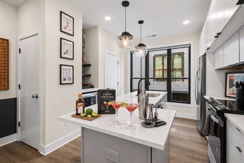 A bright, modern kitchen made for more than cooking—mix cocktails, share small bites, and gather around the island with ease.