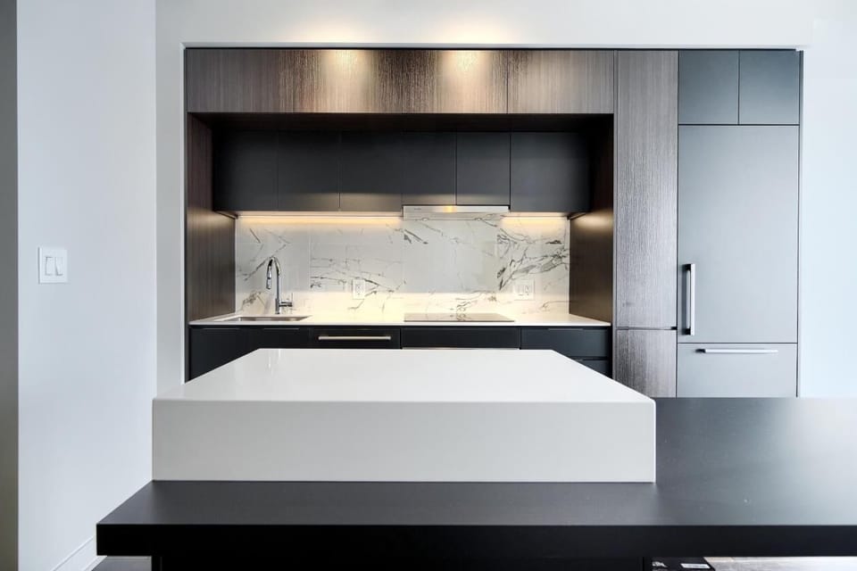 A modern kitchen with a sleek design