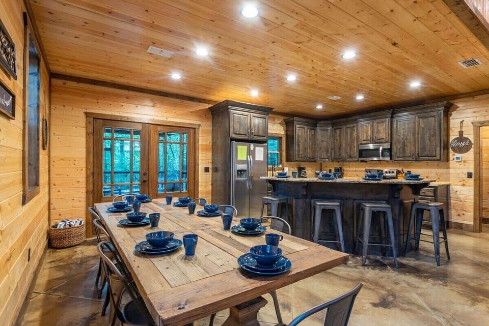 Larger view of kitchen and eating area's 