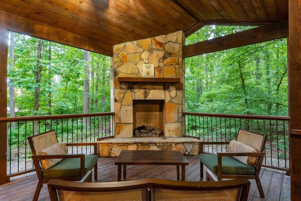 Take in the gorgeous views of the woods with our Patio Furniture and Outside Fireplace