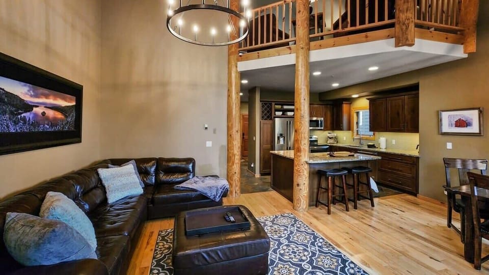 The open and social layout of the main living space makes it easy to stay connected to your group whether you are preparing a meal or relaxing on the sofa.