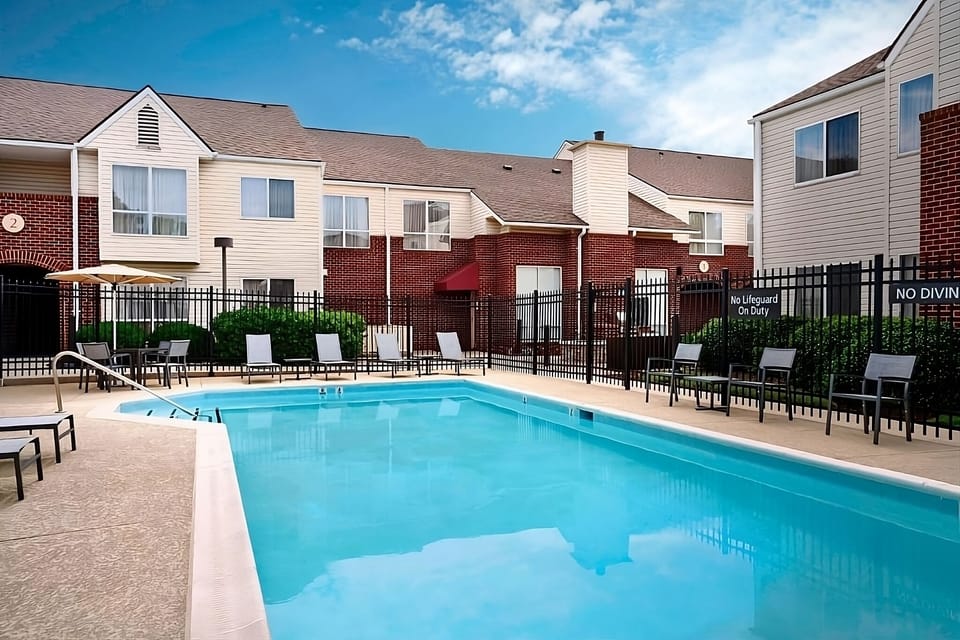 Dive into a sunny pool day with plenty of loungers.