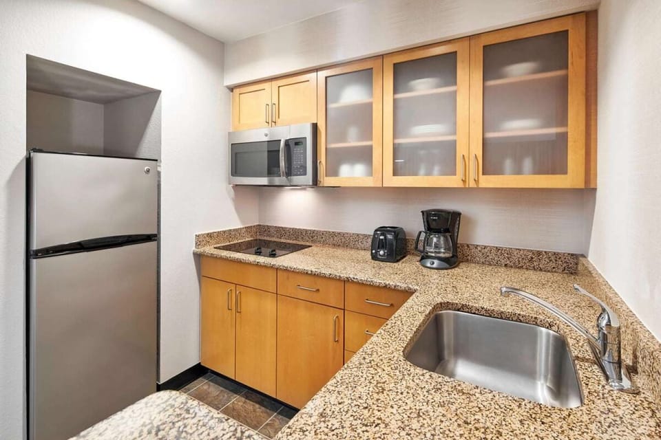 Prep snacks easily with full-size fridge, sink, and microwave.