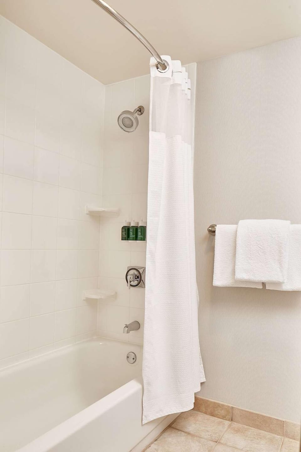 Rinse off in a clean, soothing shower and bath combo.