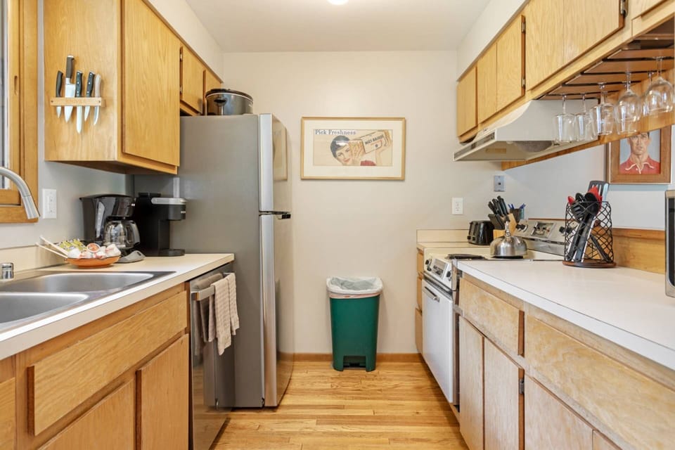 This cozy kitchen is stocked with everything you should need; coffee maker, Keurig, microwave, toaster, hand mixer, blender, and crock pot