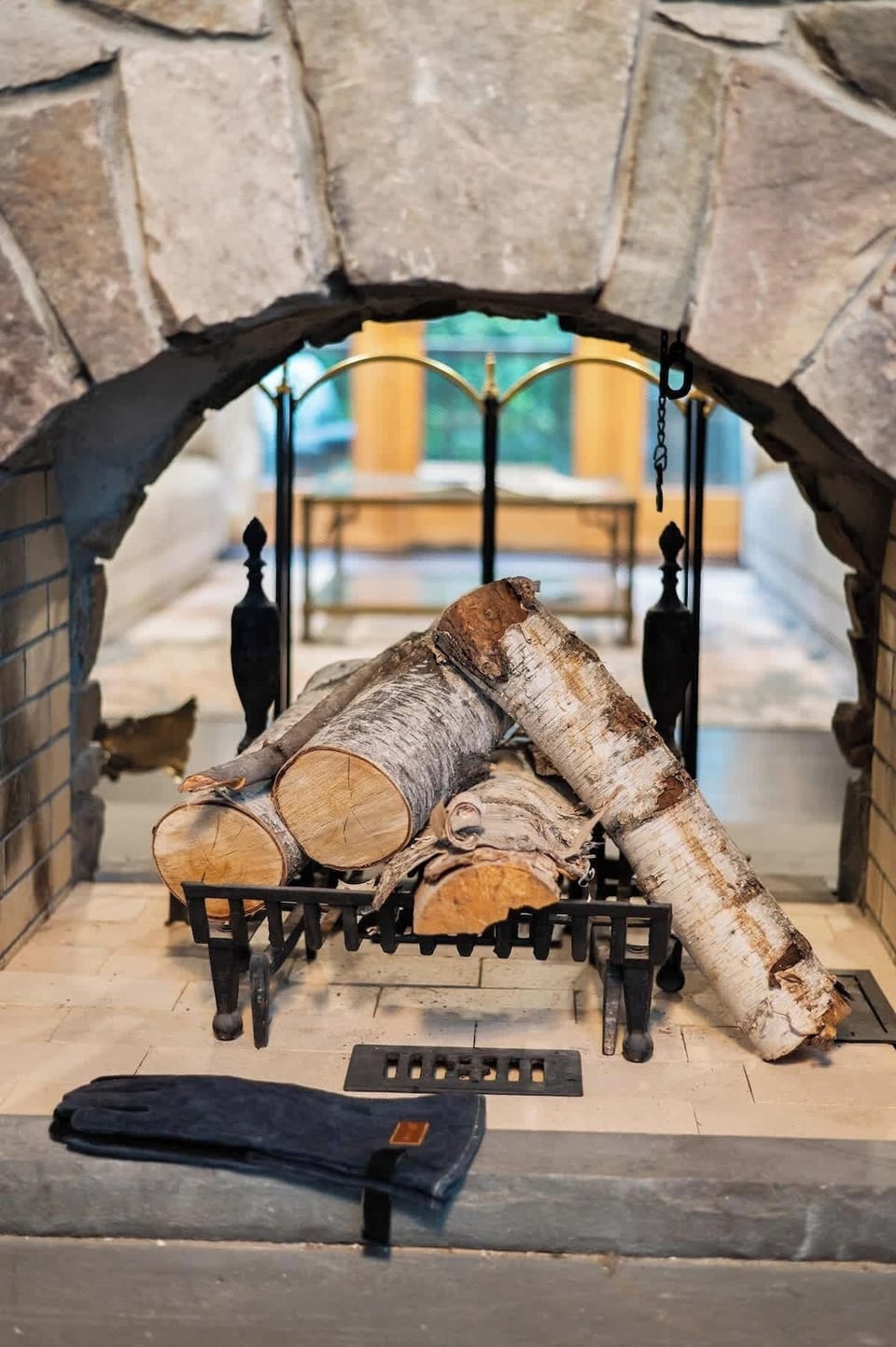 Double-sided stone fireplace - the home’s hearth