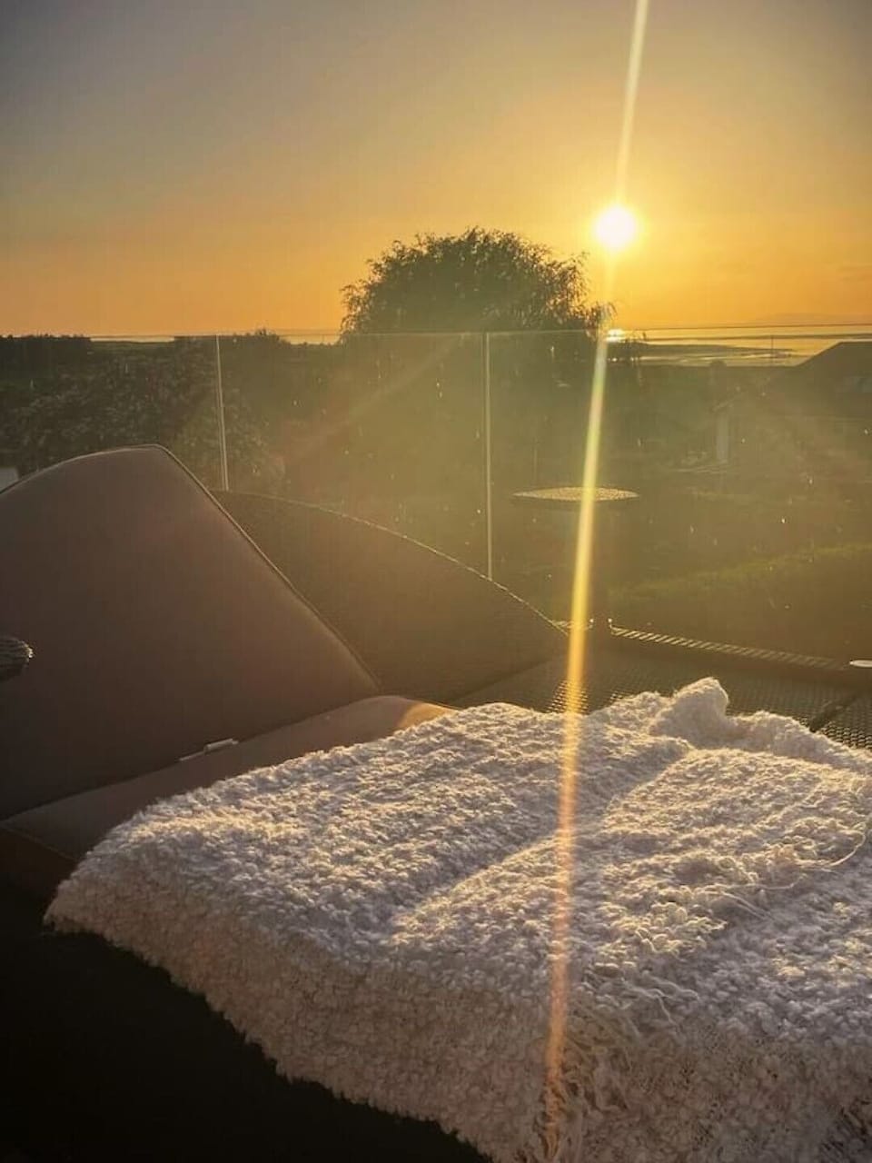 relax and enjoy the sunset from the first floor balcony