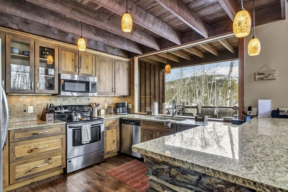 Kitchen with the biggest window over the sink you could imagine! 
