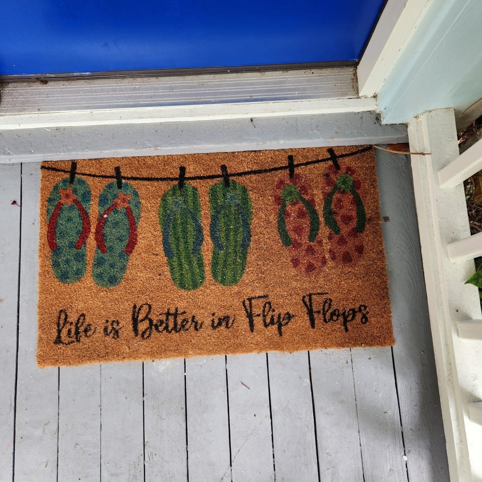 The door mat says it all.