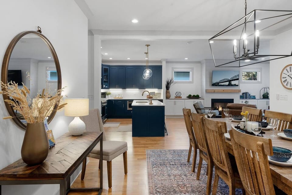 The perfect layout for relaxing with your friends and family. Spacious, yet cozy, this main living area provides a fully stocked kitchen, comfortable leather seating with a TV over the gas fireplace, and a dining table that can seat 10. 