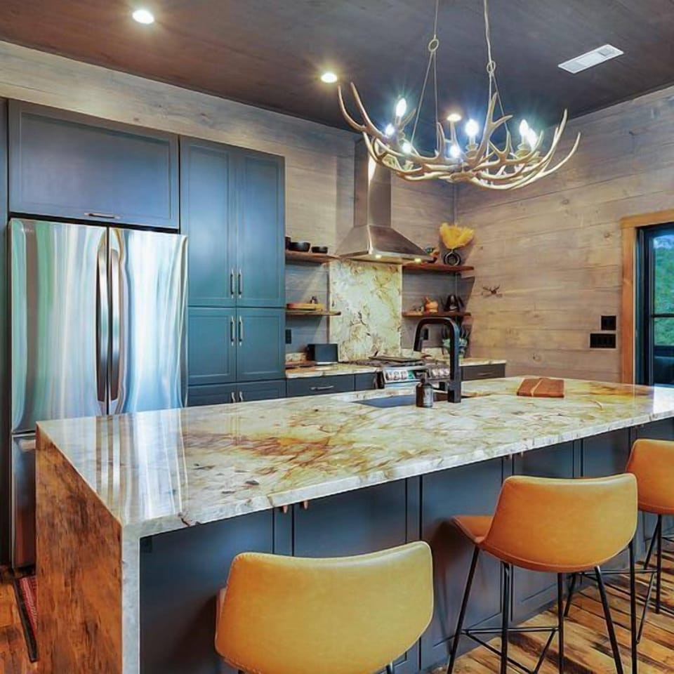 Indulge in the pleasure of dining while seated at the spacious and inviting huge island.  