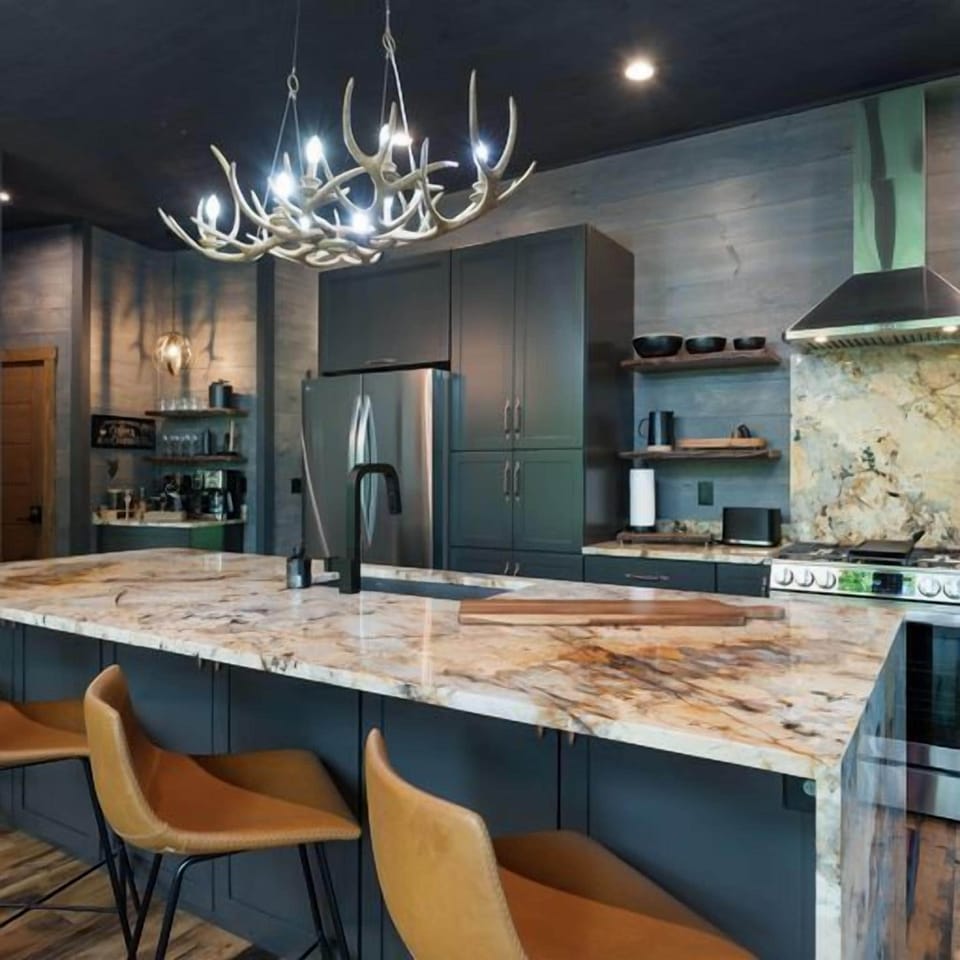 Prepare to be awestruck by the gorgeous double waterfall granite island. 