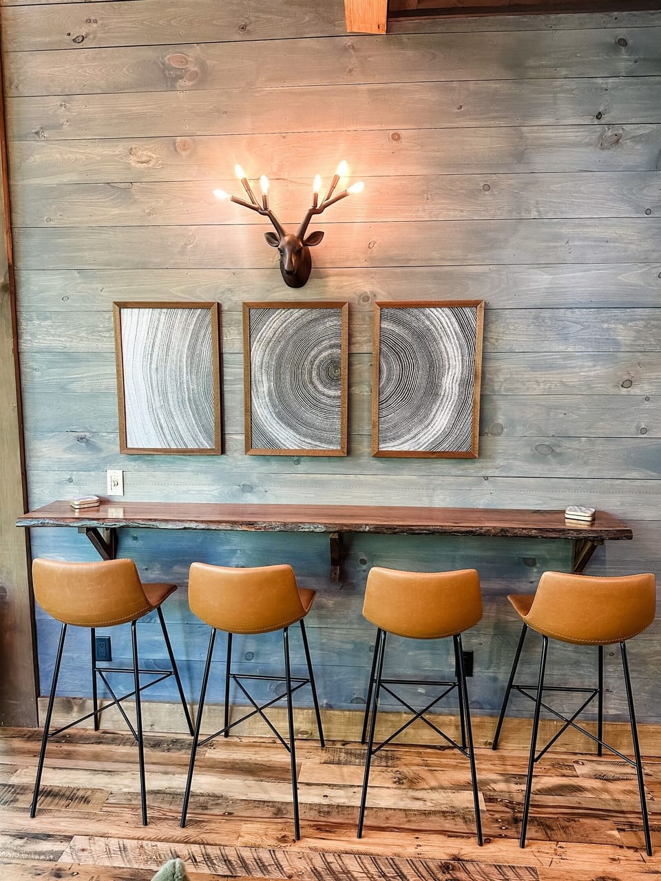 The beautiful walnut wall bar provides additional dining options.  
