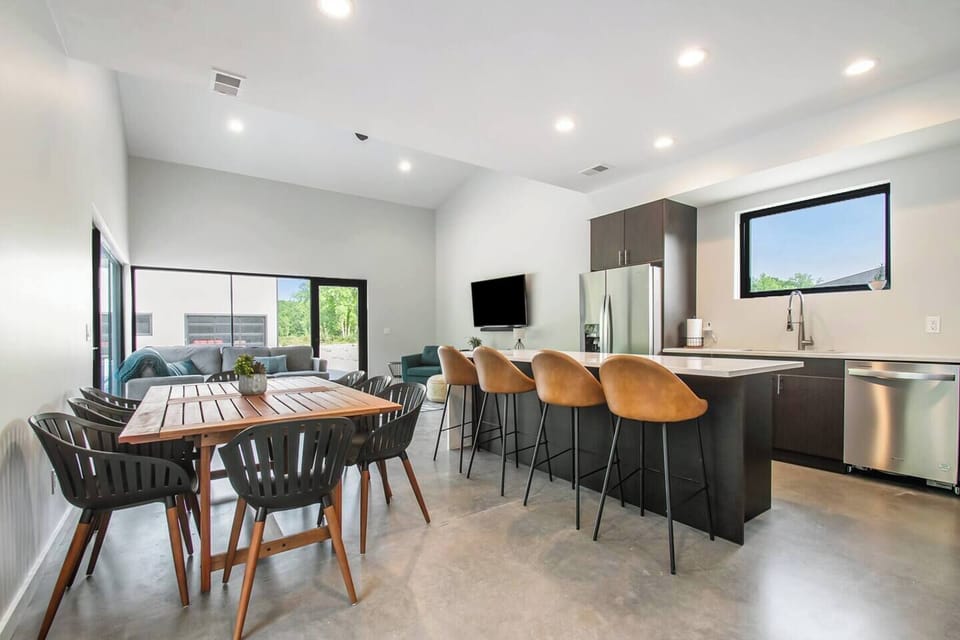 Kitchen and dining area looking at the pool