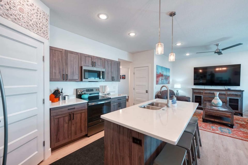 Prepare gourmet meals with ease. The well-equipped kitchen boasts everything you need to create delicious dishes.