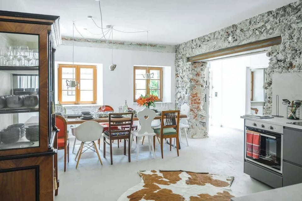 The large dinning table with 11 seats is ideal for home cooked dinners for all visiting guests. 