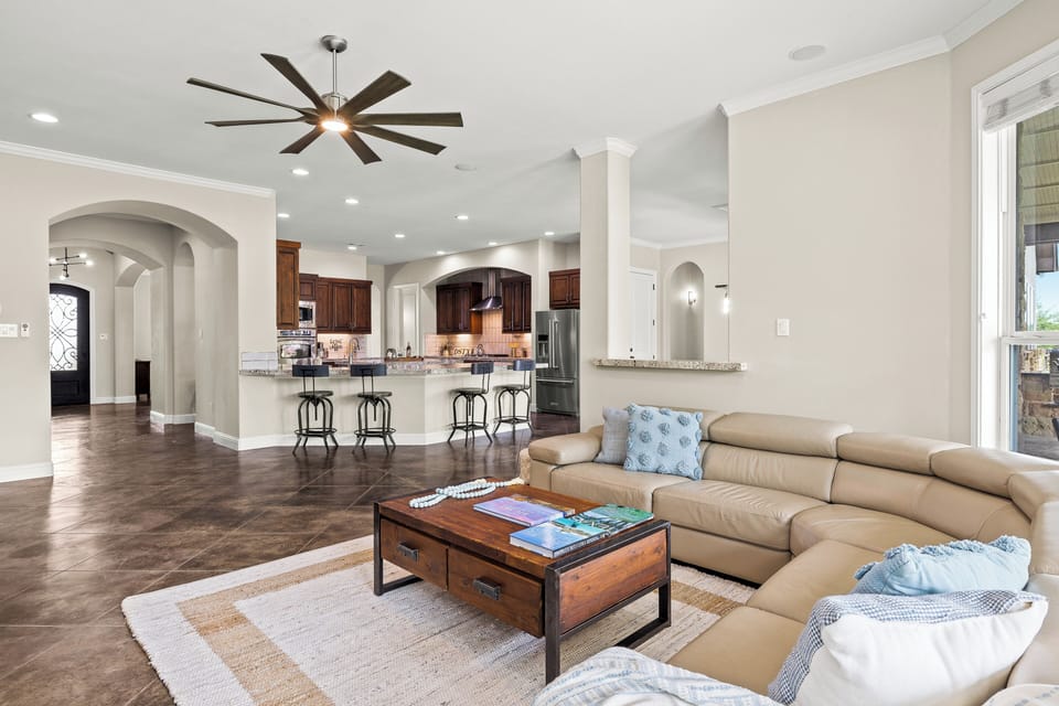 Settle into the comfort of our plush leather sectional sofas and cozy up by the inviting fireplace, creating a warm and inviting atmosphere