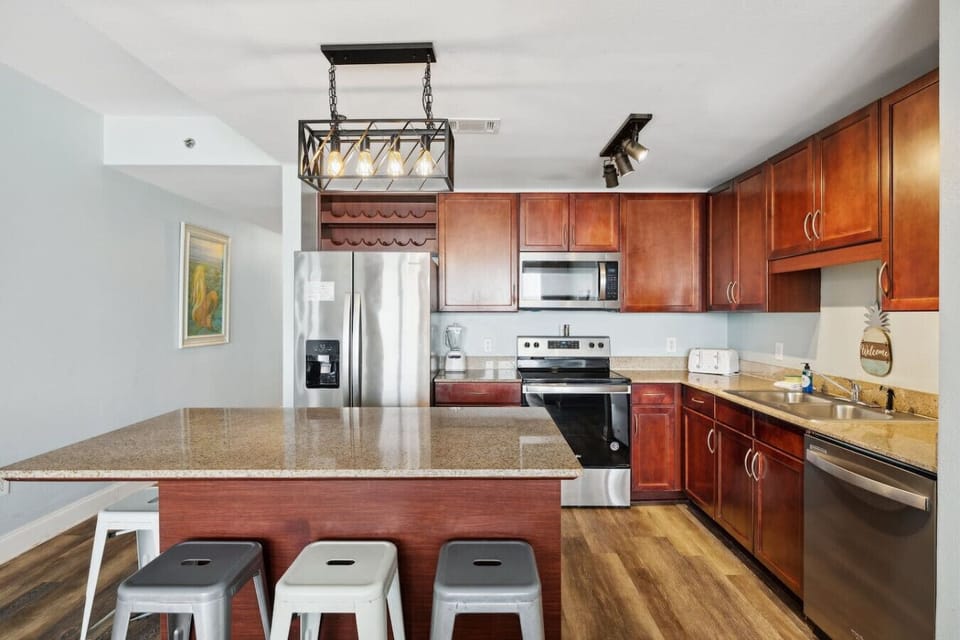 Fully Stocked Kitchen with Stainless Steel Appliances, Ocean Views and Island Bar Seating