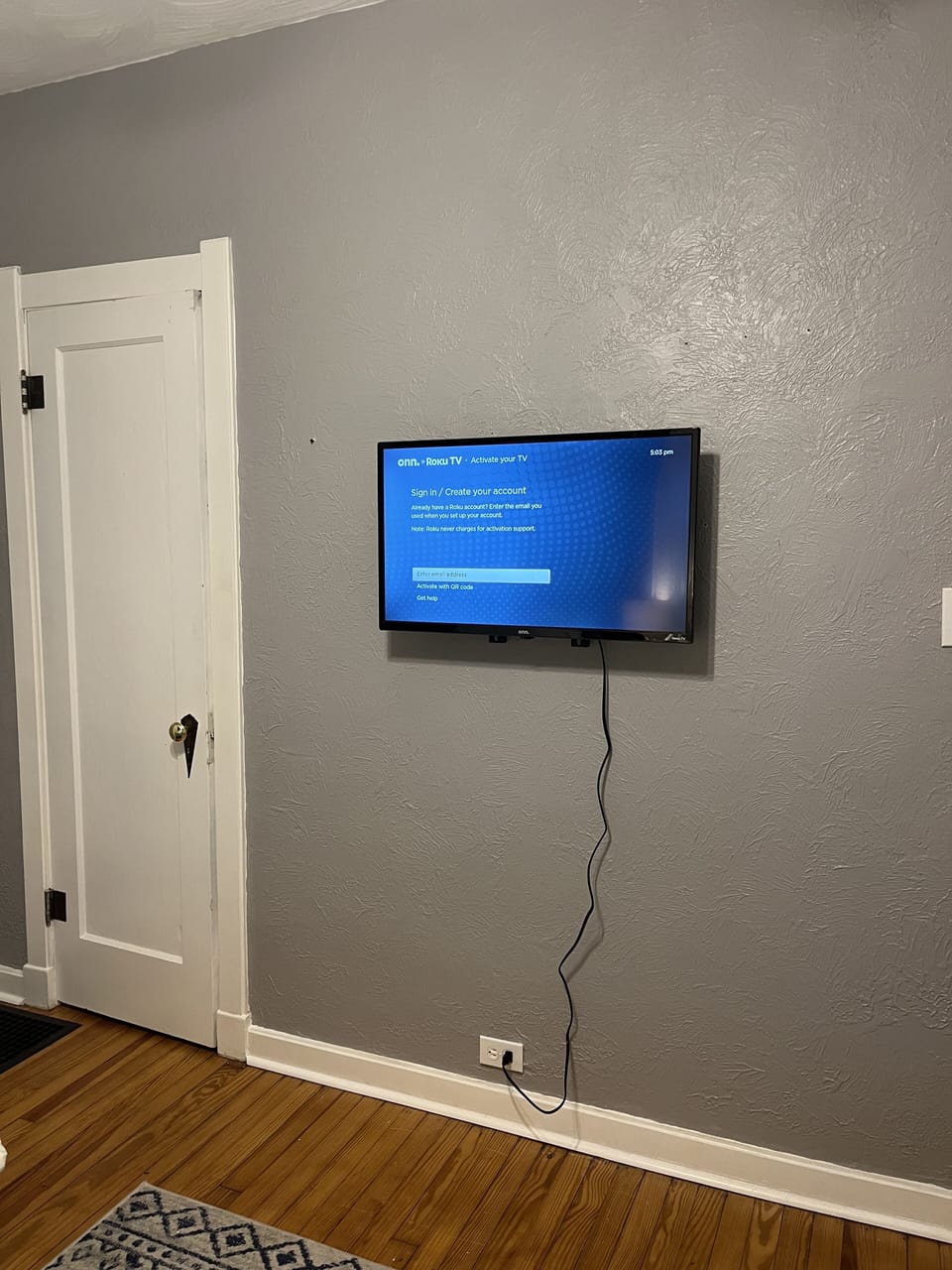 Downstairs bedroom with smart tv.