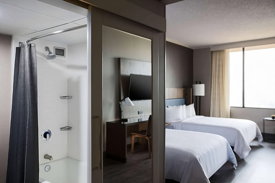 Step into a clean shower space before sinking into bed.