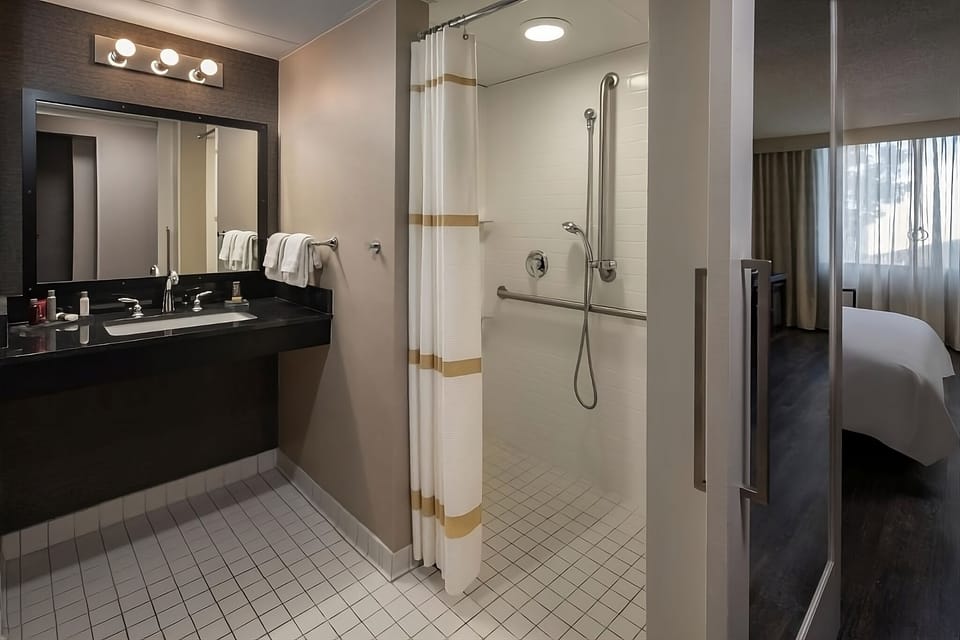 Refresh easily with a spacious vanity and walk-in shower.