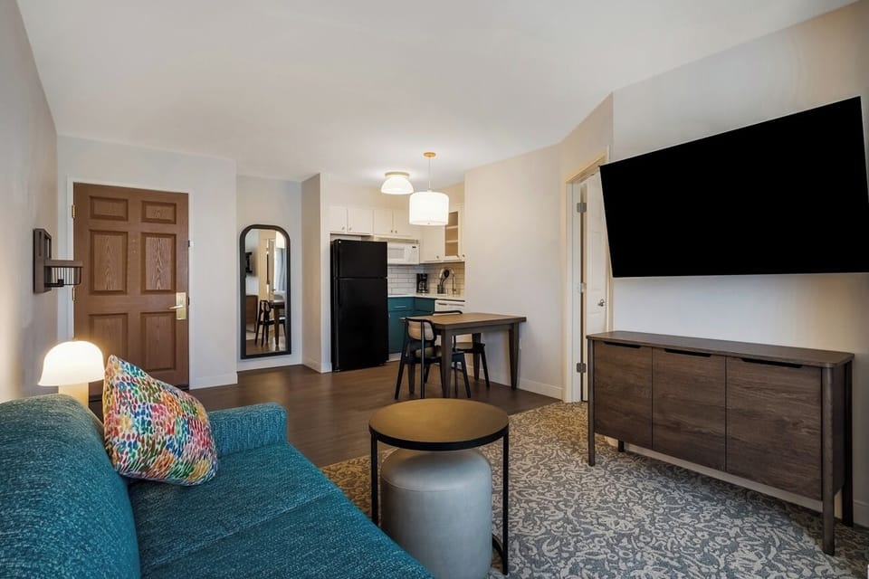 Stretch out and stream favorites on the oversized TV.