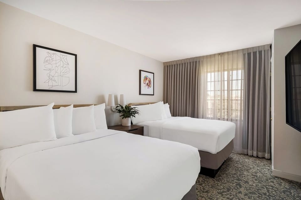 Sink into cloud-soft bedding for a deeply restful night.
