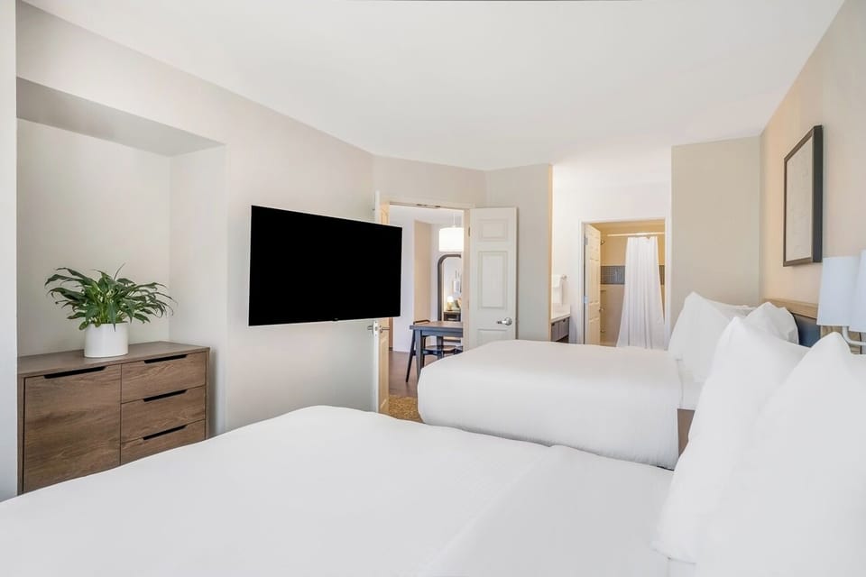 Settle into two plush beds for effortless group comfort.