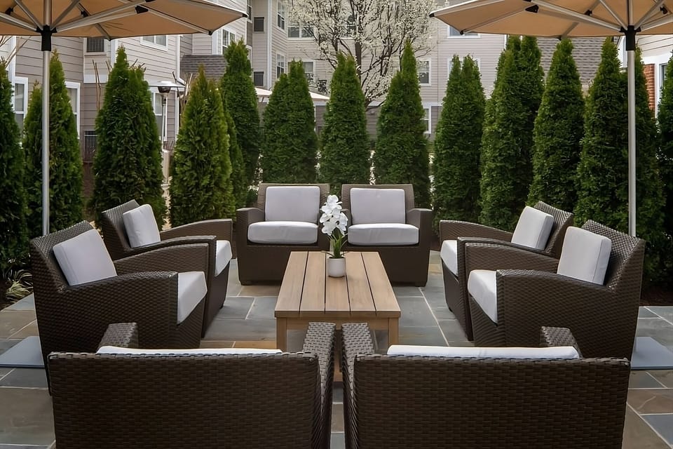Stretch out on plush seating with umbrella-shaded serenity.